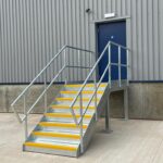 Dock leveller stair